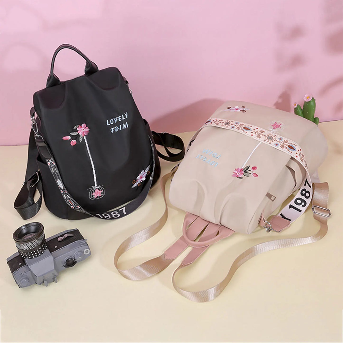 Mochila informal de tela Oxford para mujer, bolso de hombro con bordado de flores.